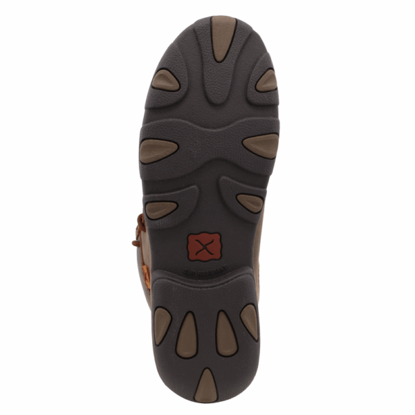 The sole of a Twisted X Women's Brown and Tooled Flower Chukka Driving Moc Casual Shoe.