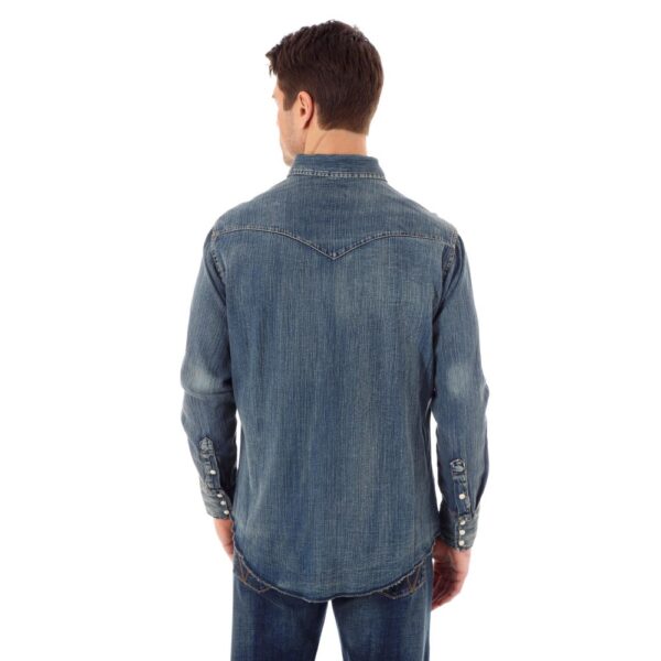 A modeled, rear facing look at the Wrangler Cowboy Cut Long Sleeve Western Denim Snap Work Shirt.