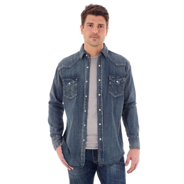 A modeled, front facing look at the Wrangler Cowboy Cut Long Sleeve Western Denim Snap Work Shirt.