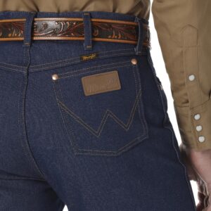 A modeled, close-up look at the detail on the back pocket of a pair of Wrangler Rigid Cowboy Cut Original Fit Jeans.