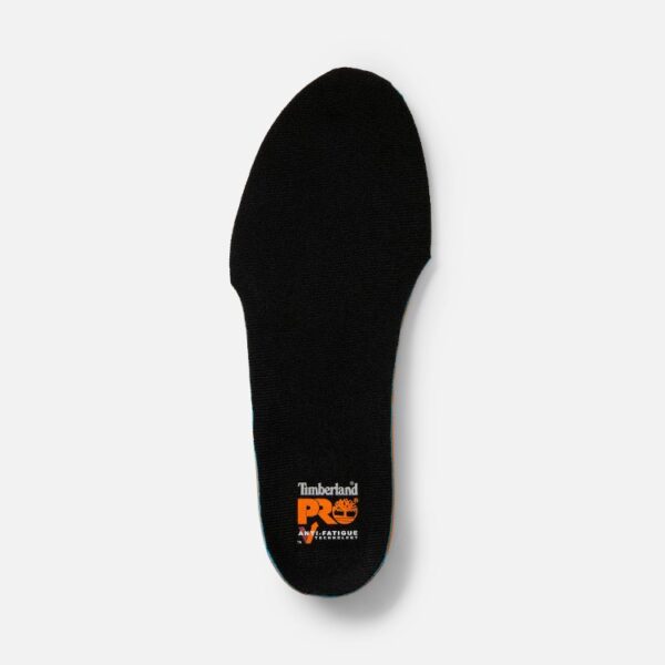 Overhead shot of the topside of a single left foot Timberland Anti-Fatigue Technology Footbed Insole in black with a blank background.