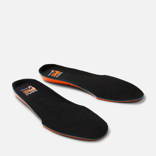 A turned pair of Timberland Anti-Fatigue Technology Footbed Insoles in black with a blank background.