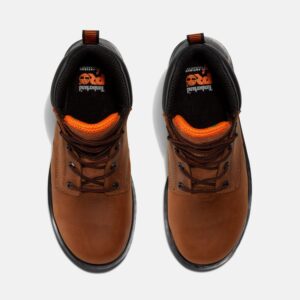 Overhead look at a pair of Timberland Ballast steel toe 6-inch men's work boots in brown on a blank background.
