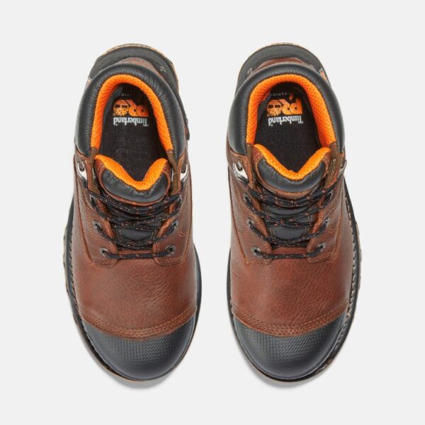 Overhead shot of a pair of Timberland Boondock composite toe 6-inch waterproof insulated men's work boots in brown with a blank background.