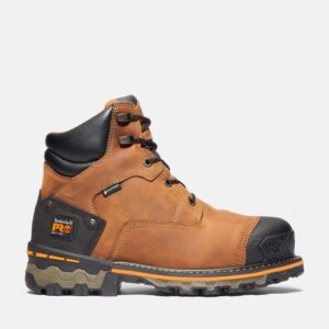 Right profile facing Timberland Boondock soft toe waterproof 6-inch men's work boot in tan and blank background.