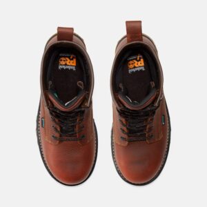 Overhead shot of a pair of Timberland Boondock waterproof composite toe 8-inch men's work boots in brown with a blank background.