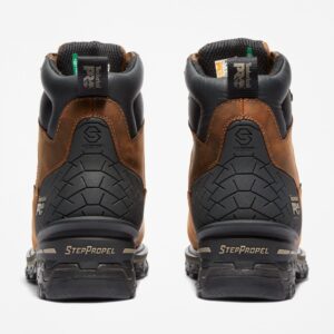 A look at the heels of a pair of Timberland Boondock HD composite toe waterproof insulated men's 6-inch work boots in brown with a blank background.