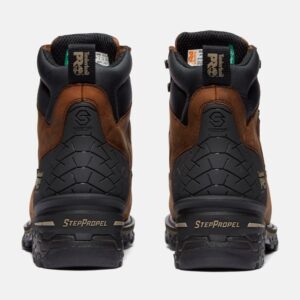 A look at the heels of a pair of Timberland Boondock HD composite toe waterproof men's 6-inch work boots in brown with a blank background.