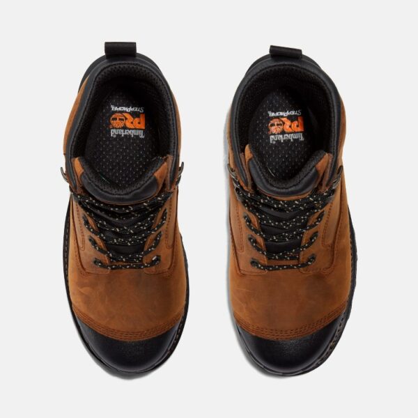 Overhead shot of a pair of Timberland Boondock composite toe waterproof men's 8-inch work boots in brown with a blank background.