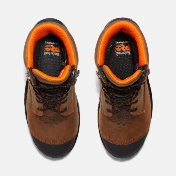 Overhead shot of a pair of Timberland Boondock HD Logger composite toe waterproof men's work boots in brown with a blank background.