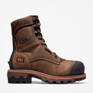 Right profile facing Timberland Boondock HD composite toe men's logger work boot in brown with blank background.