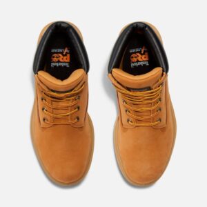 Overhead shot of a pair of Timberland Direct Attach waterproof soft toe 6-inch men's work boots in wheat color with a blank background.