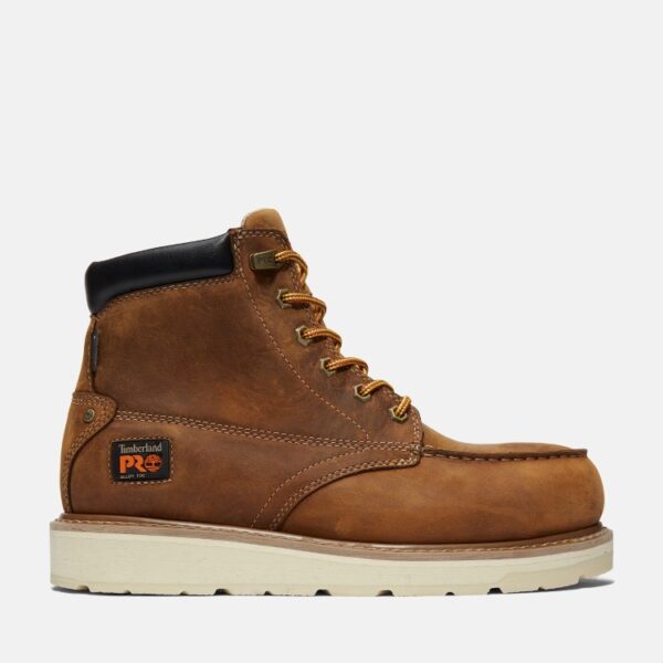 Right profile facing Timberland Gridworks alloy toe waterproof men's 6-inch work boot in light brown with blank background.