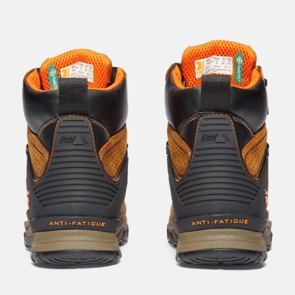 A look at the heels of a pair of Timberland Hypercharge soft toe waterproof men's 6-inch work boots in tan with a blank background.