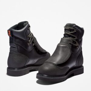 Offset pair of Timberland Met Guard steel toe waterproof 8-inch men's work boot in black with a blank background.