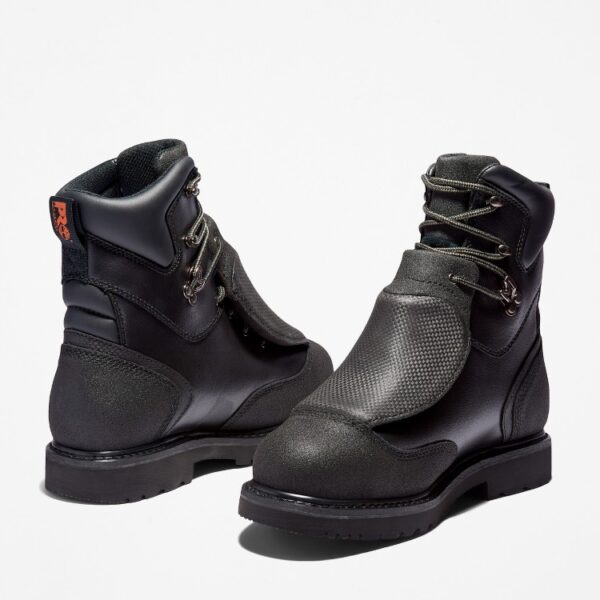 Offset pair of Timberland Met Guard steel toe waterproof 8-inch men's work boot in black with a blank background.