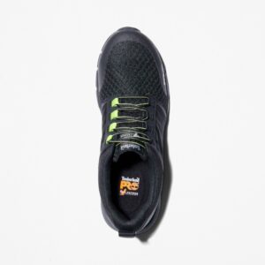 Overhead shot of the right shoe of a Timberland Radius composite toe low top men's work sneakers in black and green with a blank background.