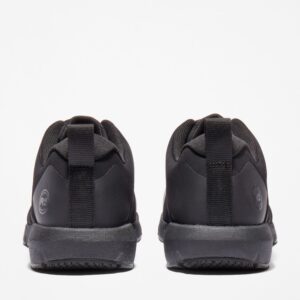 A look at the heels of a pair of Timberland Radius composite toe men's low top work sneakers in black with a blank background.