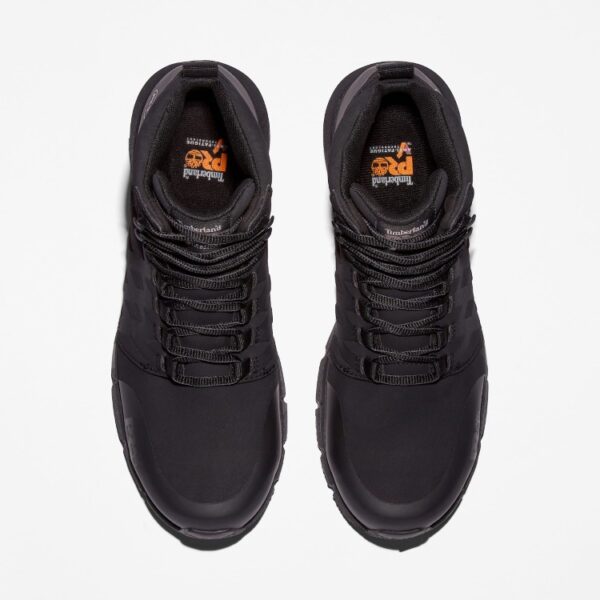 Overhead shot of a pair of Timberland Radius composite toe men's high top work sneakers in black with a blank background.