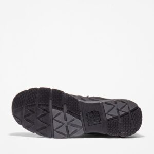 The sole of the right boot on a Timberland Radius composite toe men's high top work sneakers in black with a blank background.