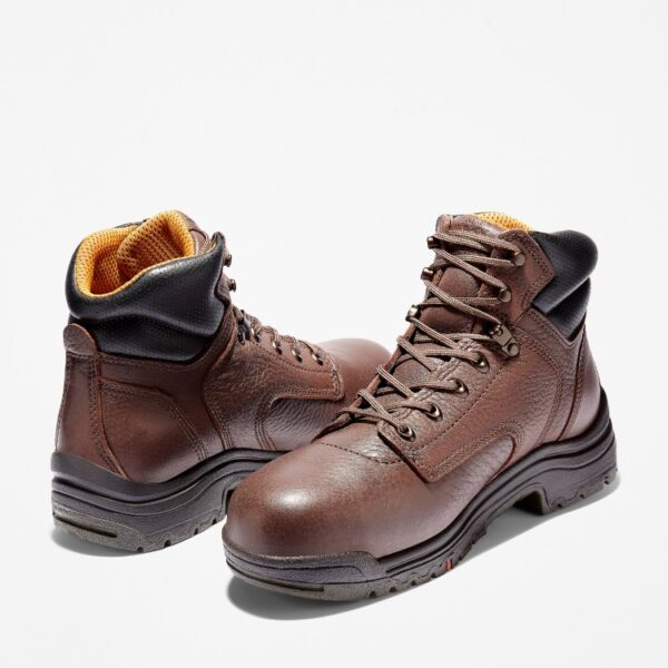 Offset pair of Timberland TiTAN Alloy Toe Waterproof 6" Men's Work Boot with a blank background.