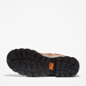 The sole of the right boot on a Timberland TiTAN EV composite toe men's 6-inch work boots in brown with a blank background.