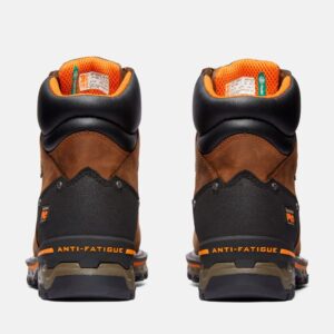 A look at the heels of a pair of Timberland PRO Boondock composite toe 6-inch waterproof men's work boots in brown with a blank background.