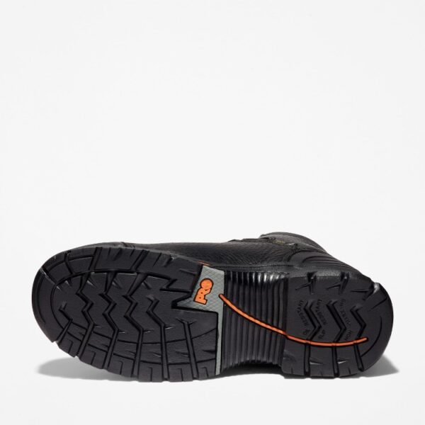 The sole of the right boot on a Timberland PRO Endurance waterproof steel toe 6-inch men's work boot in black with a blank background.