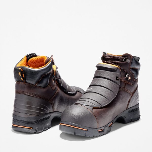Offset pair of Timberland PRO Endurance Met Guard steel toe 6-inch men's work boots in brown with a blank background.