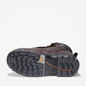 The sole of the right boot on a Timberland PRO Endurance Met Guard steel toe men's work boot in brown with a blank background.