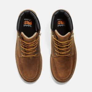 Overhead look at a pair of Timberland PRO Gridworks soft toe waterproof men's 6-inch work boots in brown on a blank background.