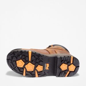 The sole of the right boot on a Timberland PRO Helix HD composite toe waterproof men's 6-inch work boots in tan with a blank background.