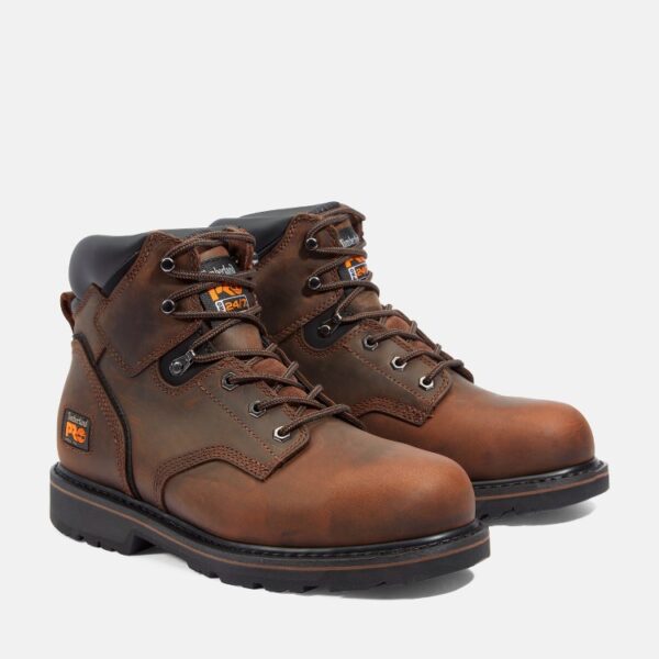 A turned pair of Timberland PRO Pit Boss steel toe 6-inch men's work boots in brown with a blank background.