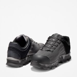 Offset pair of Timberland PRO Powertrain Sport alloy toe men's work sneakers in gray and black with a blank background.