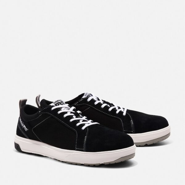 A turned pair of Timberland PRO GreenStride Berkley composite toe men's work oxford in black and white with a blank background.