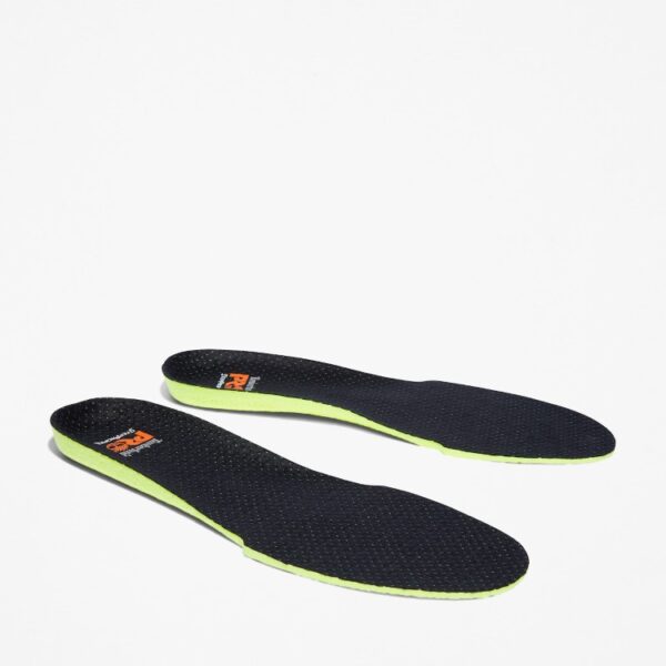 A turned pair of Timberland PRO StepPropel Insoles in black with a blank background.