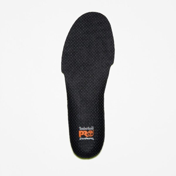 Overhead shot of the topside of a single left foot Timberland PRO StepPropel Insole in black with a blank background.