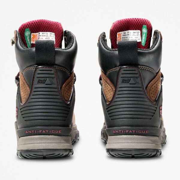 A look at the heels of a pair of Timberland Hypercharge composite toe waterproof women's 6-inch work boots in brown with a blank background.