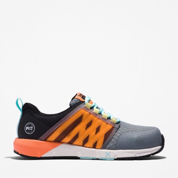 Right profile facing Timberland Radius composite toe women's work sneakers in gray, orange, black, and light blue with a blank background.