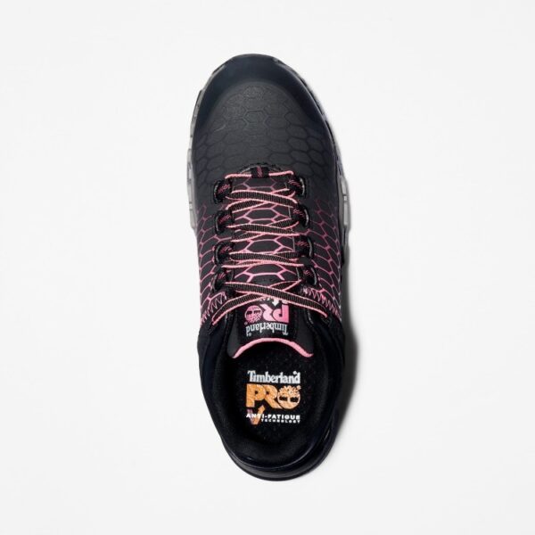 Overhead shot of the right shoe of a Timberland PRO Powertrain Sport alloy toe women's work sneakers in black and pink with a blank background.