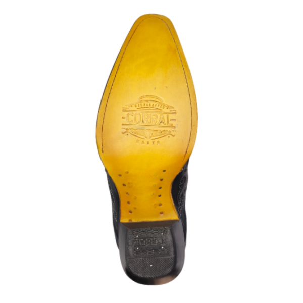 A look at sole of a Corral Embroidered Studded Black Leather Pointed Toe Cowgirl Boot.