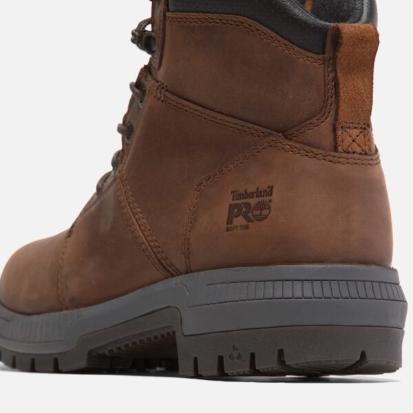 Close up of Timberland Montauk non-safety toe men's 6-inch work boot in brown showing soft toe stamp with a blank background.