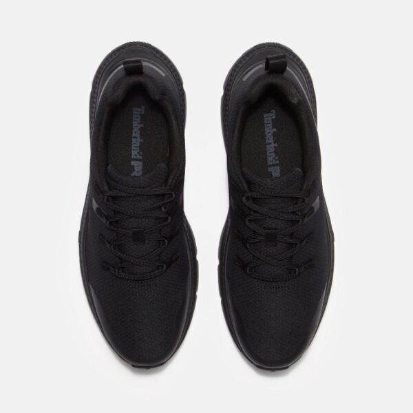 Overhead look at a pair of Timberland Power Shift soft toe hospitality men's work sneakers in black on a blank background.