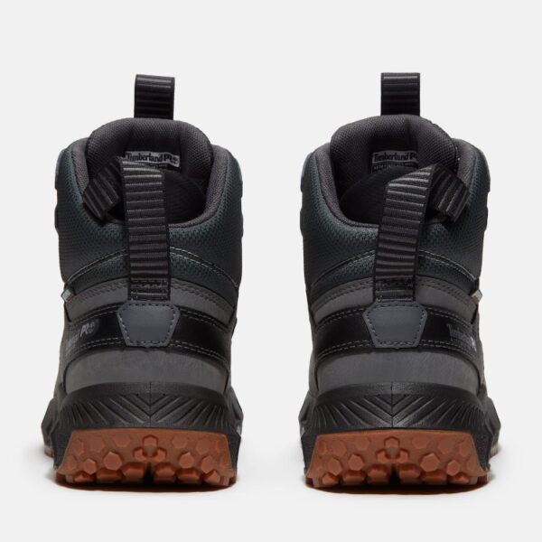 A look at the heels of a pair of Timberland Tempe alloy toe waterproof 6-inch men's work boots in gray with a blank background.
