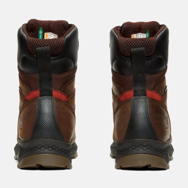 A look at the heels of a pair of Timberland TiTAN EV composite toe waterproof insulated 8-inch men's work boots in brown with a blank background.