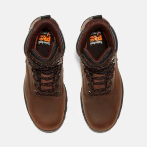 Overhead look at a pair of Timberland TiTAN EV composite toe waterproof insulated 8-inch men's work boots in brown on a blank background.
