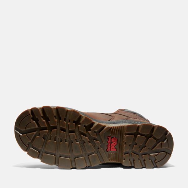 The sole of the right boot on a Timberland TiTAN EV composite toe waterproof insulated men's 8-inch work boots in brown with a blank background.