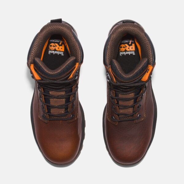 Overhead look at a pair of Timberland TiTAN EV composite toe waterproof 8-inch men's work boots in brown on a blank background.