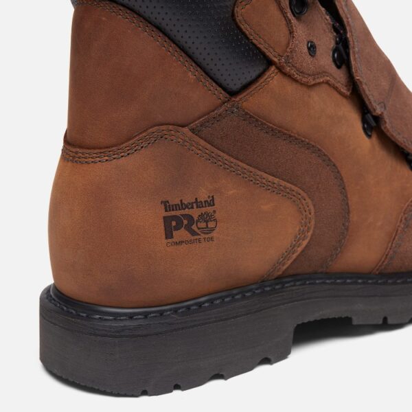 Close up of Timberland PRO Ambridge Met Guard safety toe men's 6-inch work boot in brown showing composite toe stamp with a blank background.