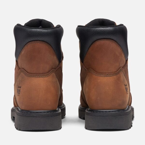 A look at the heels of a pair of Timberland PRO Ambridge Met Guard composite toe 6-inch men's work boots in brown with a blank background.
